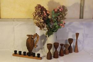 lot 42 image: Collection of Vintage Wooden Candle Holders, Handcrafted Vase with Faux Flowers, and Wooden Pitcher