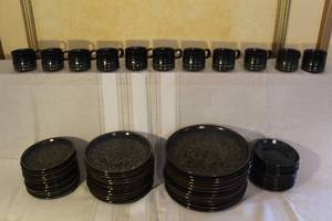 lot A-54 image: Mid-Century Stoneware Dinnerware Set with Plates, Saucers, and Cups - Swirl Pattern