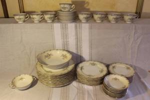 lot 62 image: Set of Pope Gosser China Floral Dinnerware with Cups, Plates, and Bowls