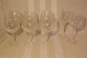lot 94 image: Set of 8 Clear Patterned Wine Glasses