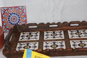 lot 103 image: Mexican Kitchenware Collection with Press, Trays, Tortilla Server, and Salsa Book