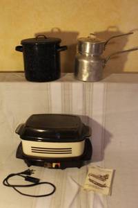 lot 106 image: West Bend 4 Qt Slow Cooker with Manual, Graniteware Steamer Pot, and Aluminum Double Boiler Set