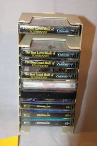 lot 113 image: Toshiba Portable Cassette Player with Tape Collection and Storage Rack