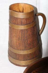 lot 115 image: Vintage Wooden Pitcher, Hammered Metal Tray, and Set of Oval Wooden Bread Boards