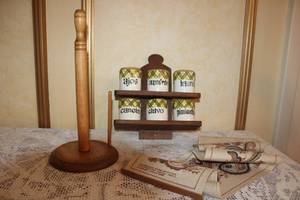lot 119 image: Vintage Kitchen Set with Wooden Spice Rack, Six Ceramic Spice Jars, Paper Towel Holder, and Table Runner