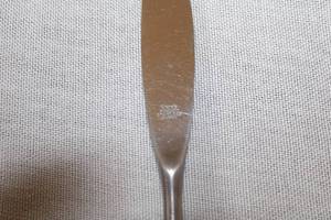 lot 120 image: Set of Stainless Steel Flatware with Black Handles and Tray