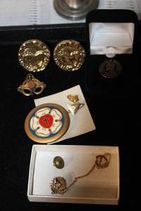 lot 147 image: Collection of Vintage Pins, Medals, and Metal Bud Vase