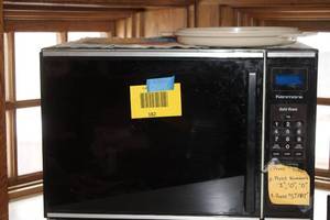 lot 182 image: Kenmore Solid State Countertop Microwave Oven Model 565.6765400