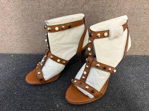 lot 67 image: Coach Isabel Semi Matte Calf Saddle - Size 10M