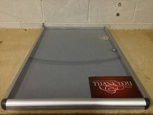lot 102 image: Silver Aluminum Display Frame With Keys