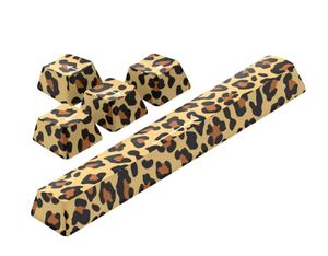 lot 437 image: LOT OF 15 North Key Cap Cheetah Print Print Packs - Cute