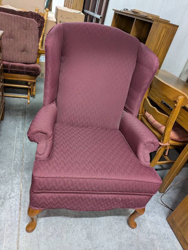 lot 38 image: Traditional Wing Back Armchair Upholstered in MaroonBurgundy Fabric