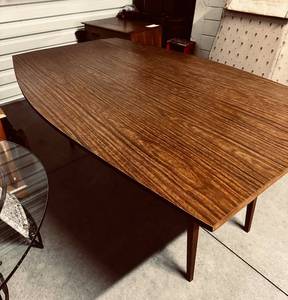 lot 63 image: Mid-Century Modern Boat-Shaped Dining Table w Durable Laminate Top