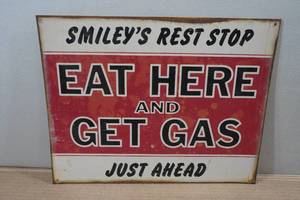 lot 143 image: Novelty Metal Sign - Smileys Rest Stop