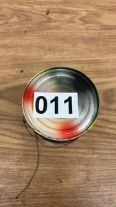 lot 11 image: Tin Can with Multicolor Spray Paint and Wrapped Wire