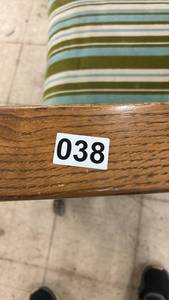 lot 38 image: Wooden Rocking Chair with Green Striped Cushion