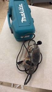 lot 80 image: Porter Cable Belt Sander with Makita Carrying Case