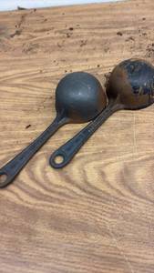 lot 91 image: Set of 2 F.K. Ornstein & Co. Inc. Vintage Cast Iron Ladles
