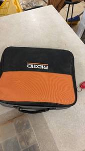 lot 101 image: Ridgid Soft Tool Bag with Red Keychain