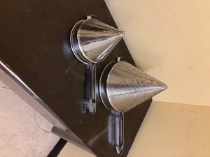 lot -41 image: 2 large commercial strainers