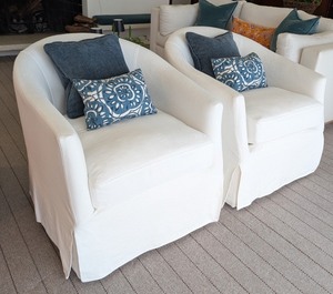 lot 24 image: ML - Pair of Essentials for Living Stitch and Hand Swivel Club Chairs