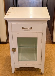 lot 40 image: ML - Small White Storage Cabinet with Glass Door and Drawer
