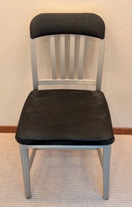 lot 90 image: LL - Emeco Navy Chair with Black Upholstered Seat and Back