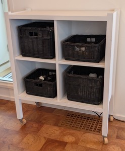 lot 101 image: ML - White Rolling Storage Cabinet with 4 Black Wicker Baskets