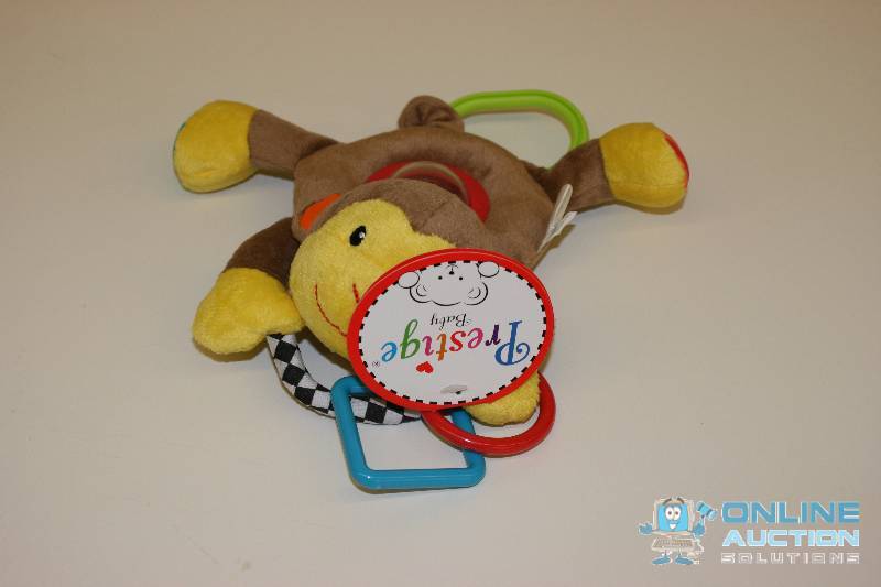 lot 203 image: Prestige Baby Toy Monkey.