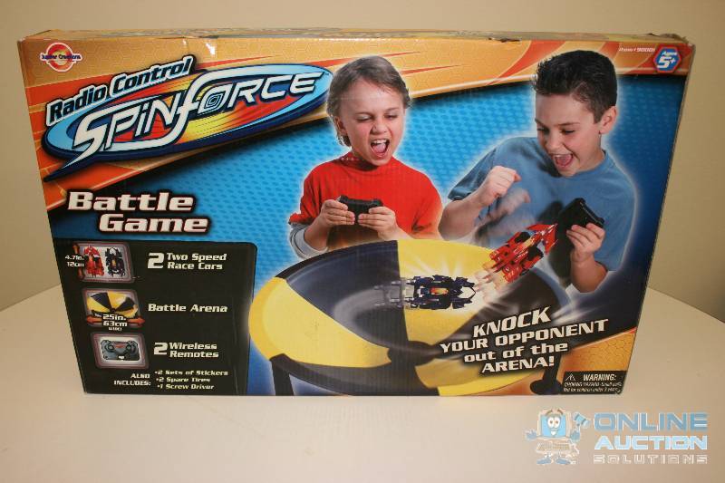 lot 233 image: Radio Control Spin Force Battle Game 2 Two Speed Race Cars 2 Wireless Remotes.