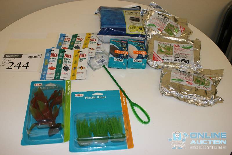 lot 244 image: Aquarium Lot Including Filters (6) Plants (2) Food (4) Net.