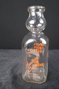 lot 371 image: Milk bottle - vintage Maine dairy ad (Chisholm, ME)