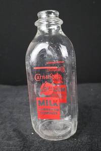 lot 372 image: Milk Bottle - Carnation Milk Company
