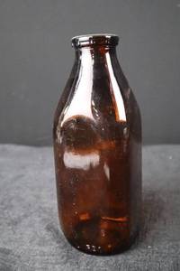 lot 373 image: Glass Bottles - Amber & Clear One-Quart Capacity