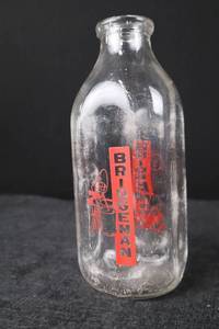 lot 375 image: Milk Bottle - Bridgeman Red Vertical Logo