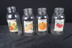 lot 379 image: Seed Jars - Northrup King & Co. Nasturtium, Carrot, Pumpkin & Radish