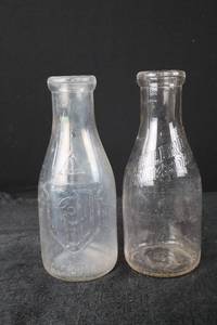 lot 380 image: Milk Bottles - One Quart Embossed Crest (2-Pack)