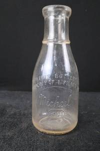 lot 382 image: Glass Bottle - Michael Bros Embossed Script One Quart
