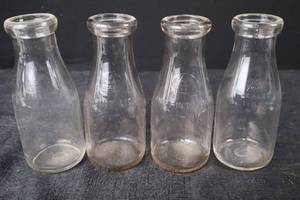 lot 385 image: Glass Liquor Bottles - One Pint Liquor Embossing (Set of 4)