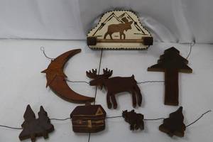 lot 453 image: Wooden Christmas Garland - Moose, Moon & Cabin Motifs