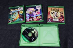 lot 497 image: Xbox One Bundle - Dragon Age Inquisition, Rayman Legends, Save the Light, and Dont Starve Mega Pack