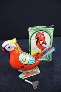 lot 34 image: Wind-Up Parrot Bird Toy - Jumping Action (Includes Key)