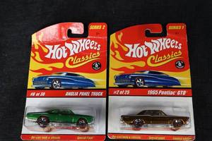 lot 38 image: Hot Wheels Classics - Anglia Panel Truck & 1965 Pontiac GTO (Error Hotwheel Says Panek Truck But Is A GTO