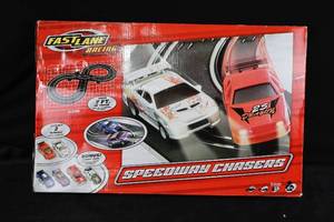 lot 63 image: FastLane Speedway Chasers Slot Car Set