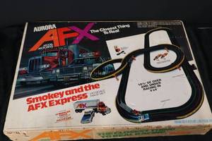 lot 145 image: Aurora AFX Smokey and the AFX Express Slot Car Set