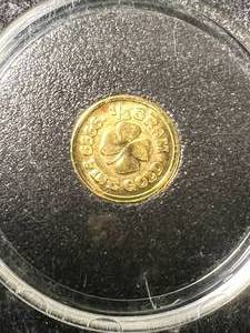 lot 15 image: HALF GRAM .9999 FINE GOLD MONARCH METALS ROUND IN CASE