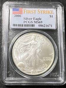 lot 16 image: 2006 AMERICAN SILVER EAGLE PCGS MS69