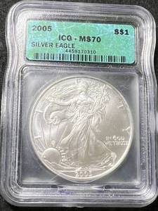 lot 41 image: 2005 AMERICAN SILVER EAGLE ICG MS70