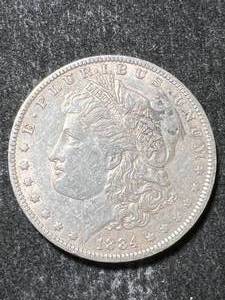 lot 46 image: 1884-O US MORGAN SILVER DOLLAR