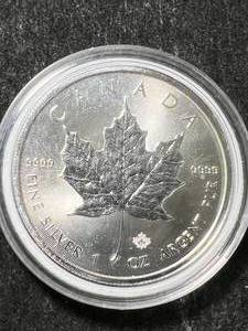 lot 56 image: 2023 CANADIAN MAPLE LEAF 1 TROY OZ .9999 FINE SILVER IN AIRTITE